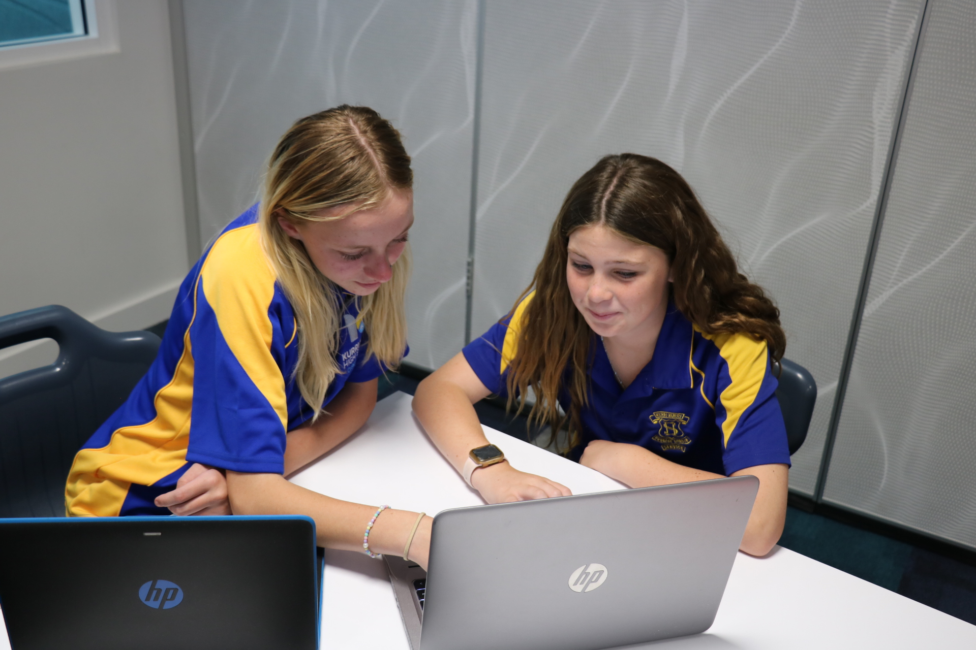 Students working at a computer